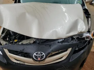 2011 Toyota Corolla L with VIN 2T1BU4EE2BC691212, listed as a Copart auction lot 51336855 with 0 mi miles and Salvage Title. Bid and sale history available at carsss.com. Image 12.