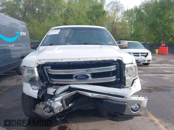 2014 Ford F-150 XL with VIN 1FTFW1EFXEKE92754, listed as a IAAI auction lot 42109551 with 219,130 mi miles. Bid and sale history available at carsss.com. Image 13.