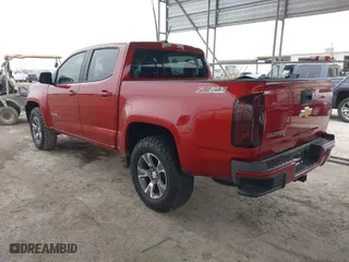2015 Chevrolet Colorado 4WD Z71 with VIN 1GCGTCE38F1165453, listed as a IAAI auction lot 41548031 with 147,742 mi miles. Bid and sale history available at carsss.com. Image 3.