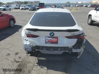 2023 BMW i4 eDrive40 with VIN WBY73AW06PFN86342, listed as a Copart auction lot 57965313 with 5,244 mi miles. Bid and sale history available at carsss.com. Image 6.