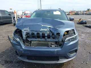 2020 Jeep Cherokee Latitude z VIN 1C4PJLCB7LD631903, wystawiony jako IAAI lot #42523873 z przebiegiem 49 651 mil mil oraz . Historia ofert i sprzedaży dostępna na DreamBid. Obrazek 12.