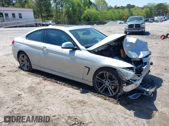 2014 BMW 4 Series 428i with VIN WBA3N7C50EK220438, listed as a IAAI auction lot 41990873 with 141,736 mi miles and . Bid and sale history available at carsss.com. Image 1.