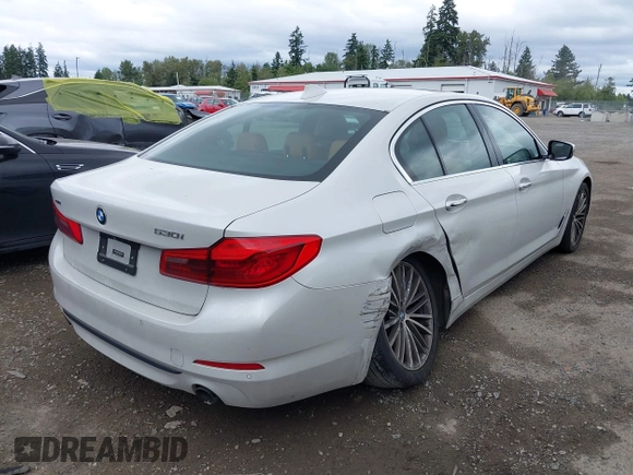 2018 BMW 5 Series 530i xDrive with VIN WBAJA7C5XJWA72470, listed as a IAAI auction lot 42526656 with 66,979 mi miles and . Bid and sale history available at DreamBid. Image 4.