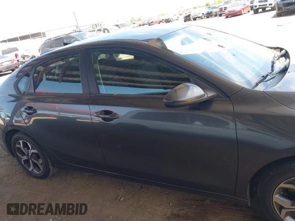 2021 Kia Forte LXS z VIN 3KPF24AD7ME294409, wystawiony jako IAAI lot #42124606 z przebiegiem 91 567 mil mil oraz . Historia ofert i sprzedaży dostępna na DreamBid. Obrazek 13.
