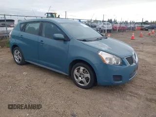 2009 Pontiac Vibe w/1SA with VIN 5Y2SP67899Z409092, listed as a IAAI auction lot 42061057 with 268,018 mi miles. Bid and sale history available at carsss.com. Image 1.