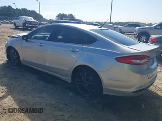 2018 Ford Fusion SE with VIN 3FA6P0H79JR237925, listed as a IAAI auction lot 40043643 with 147,919 mi miles. Bid and sale history available at carsss.com. Image 3.