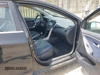2014 Hyundai Elantra GT with VIN KMHD35LH5EU171894, listed as a IAAI auction lot 42123853 with 97,541 mi miles. Bid and sale history available at carsss.com. Image 5.