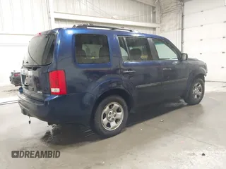 2014 Honda Pilot LX with VIN 5FNYF4H28EB015045, listed as a IAAI auction lot 40132499 with 139,845 mi miles and . Bid and sale history available at DreamBid. Image 4.