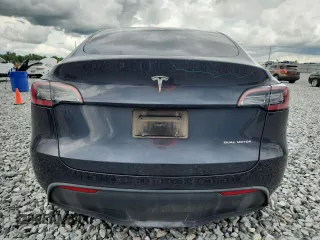 2024 Tesla Model Y Long Range with VIN 7SAYGDEE9RA255688, listed as a Copart auction lot 58918665 with 21,302 mi miles and Salvage title. Bid and sale history available at DreamBid. Image 6.