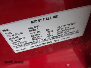 2021 Tesla Model Y Long Range with VIN 5YJYGDEE3MF212845, listed as a IAAI auction lot 41864260 with 43,451 mi miles. Bid and sale history available at carsss.com. Image 9.
