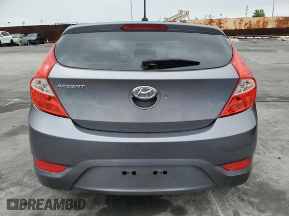 2014 Hyundai Accent GS with VIN KMHCT5AE4EU184401, listed as a Copart auction lot 54960195 with 135,134 mi miles and Clean Title. Bid and sale history available at carsss.com. Image 6.