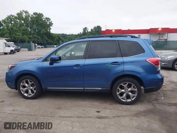 2018 Subaru Forester Touring with VIN JF2SJAWC6JH597365, listed as a IAAI auction lot 42606953 with 66,340 mi miles and . Bid and sale history available at DreamBid. Image 14.
