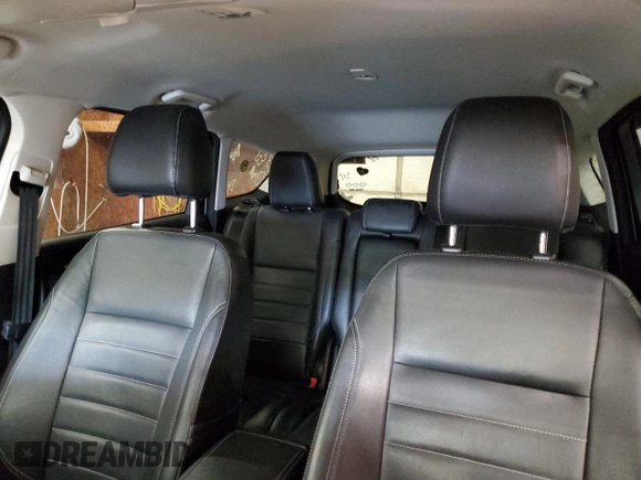 2014 Ford Escape Titanium с VIN 1FMCU0J94EUD41993, выставлен на аукционе Copart как лот 56933605 с пробегом 104 011 миль миль и Списание • Salvage title. История ставок и продаж доступна на DreamBid. Изображение 10.