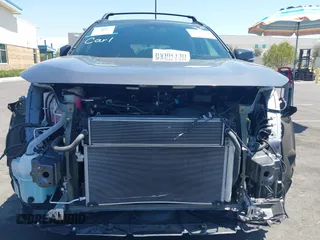 2021 Toyota RAV4 Hybrid XSE with VIN 2T3E6RFVXMW016803, listed as a IAAI auction lot 42135617 with 40,898 mi miles and . Bid and sale history available at DreamBid. Image 6.