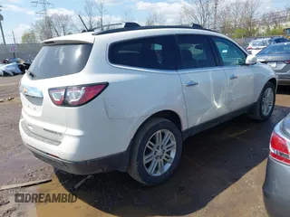 2014 Chevrolet Traverse LT with VIN 1GNKRGKD7EJ351083, listed as a IAAI auction lot 41999769 with 221,061 mi miles. Bid and sale history available at carsss.com. Image 4.