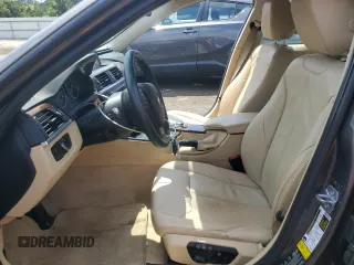 2013 BMW 3 Series 328i xDrive with VIN WBA3B5G58DNS02015, listed as a Copart auction lot 58586515 with 241,767 mi miles and Salvage title. Bid and sale history available at DreamBid. Image 7.