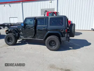 2013 Jeep Wrangler Unlimited Sahara with VIN 1C4BJWEG3DL617511, listed as a IAAI auction lot 41842979 with 149,980 mi miles and . Bid and sale history available at DreamBid. Image 14.