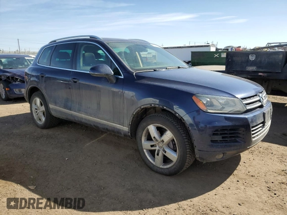 2012 Volkswagen Touareg Sport z VIN WVGFK9BP9CD000509, wystawiony jako Copart lot #48507095 z przebiegiem 164 283 mil mil oraz Szkoda całkowita • Salvage title. Historia ofert i sprzedaży dostępna na DreamBid. Obrazek 4.