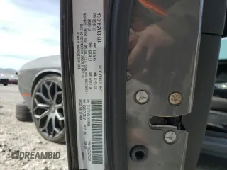2018 Dodge Challenger SXT z VIN 2C3CDZAG4JH118524, wystawiony jako Copart lot #49784495 z przebiegiem 142 701 mil mil oraz Szkoda całkowita • Salvage title. Historia ofert i sprzedaży dostępna na DreamBid. Obrazek 13.