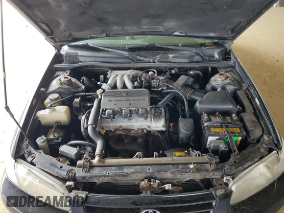 1998 Toyota Camry LE z VIN JT2BF28KXW0141801, wystawiony jako Copart lot #48014915 z przebiegiem 189 656 mil mil oraz Czysty tytuł • Clean title. Historia ofert i sprzedaży dostępna na DreamBid. Obrazek 11.