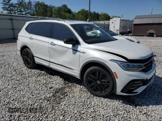 2022 Volkswagen Tiguan SE R-Line Black with VIN 3VVCB7AX5NM058171, listed as a Copart auction lot 51778885 with 61,196 mi miles and Salvage Title. Bid and sale history available at DreamBid. Image 4.