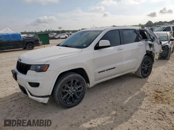 2018 Jeep Grand Cherokee Altitude with VIN 1C4RJEAG1JC397392, listed as a Copart auction lot 58214815 with 118,390 mi miles and Salvage title. Bid and sale history available at DreamBid. Image 1.