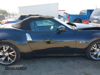 2014 Nissan 370Z Touring with VIN JN1AZ4FH8EM620208, listed as a IAAI auction lot 42094292 with 68,799 mi miles and . Bid and sale history available at DreamBid. Image 13.