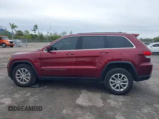 2022 Jeep Grand Cherokee Laredo X with VIN 1C4RJEAG0NC128094, listed as a IAAI auction lot 41402308 with 34,190 mi miles and . Bid and sale history available at DreamBid. Image 14.