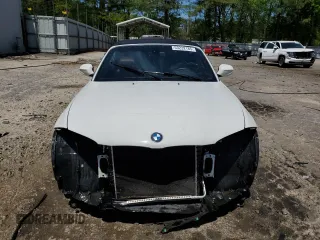 2012 BMW 1 Series 128i with VIN WBAUN1C50CVR00384, listed as a Copart auction lot 53232185 with 79,189 mi miles and Salvage title. Bid and sale history available at DreamBid. Image 5.