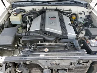 2004 Lexus LX 470 z VIN JTJHT00W743542910, wystawiony jako Copart lot #57187445 z przebiegiem 236 985 mil mil oraz Szkoda całkowita • Salvage title. Historia ofert i sprzedaży dostępna na DreamBid. Obrazek 12.