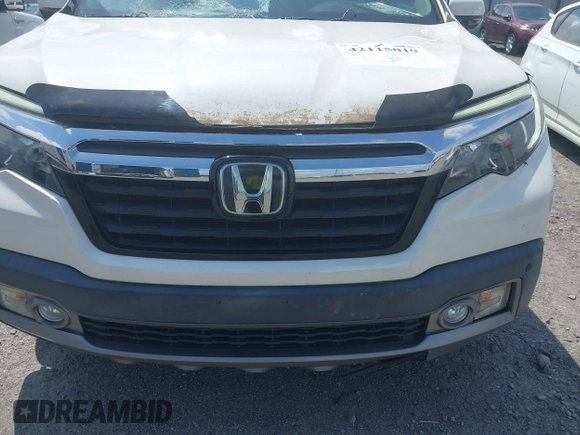 2019 Honda Ridgeline RTL-E with VIN 5FPYK3F77KB021667, listed as a IAAI auction lot 42115019 with 87,221 mi miles and . Bid and sale history available at DreamBid. Image 17.