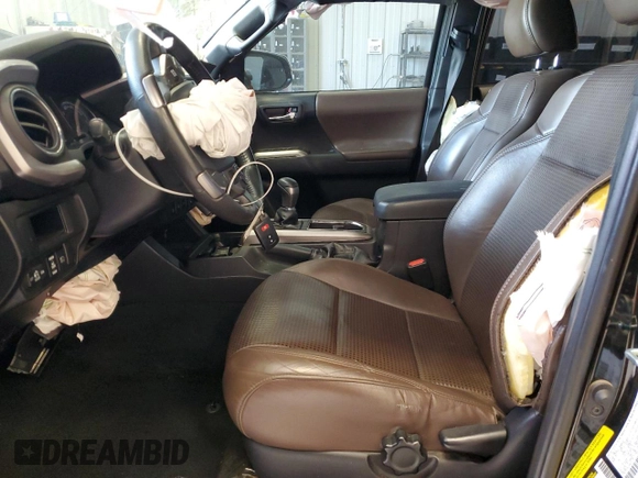 2018 Toyota Tacoma SR5 z VIN 3TMEZ5CN3JM072275, wystawiony jako Copart lot #56141695 z przebiegiem Nie podano mil oraz Czysty tytuł • Clean title. Historia ofert i sprzedaży dostępna na DreamBid. Obrazek 7.