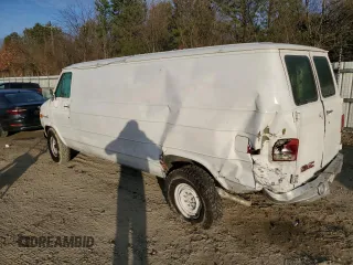 1992 GMC Vandura z VIN 2GTGG39KXN4515226, wystawiony jako Copart lot #85211254 z przebiegiem 594 809 mil mil oraz Szkody całkowita. Historia ofert i sprzedaży dostępna na DreamBid. Obrazek 2.