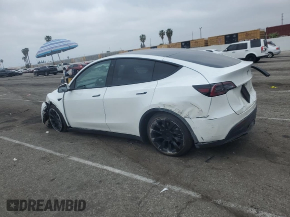 2023 Tesla Model Y Long Range with VIN 7SAYGDEE3PF583883, listed as a Copart auction lot 50920145 with 72,155 mi miles and Salvage Title. Bid and sale history available at DreamBid. Image 2.