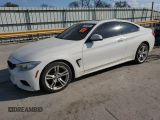 2015 BMW 4 Series 428i xDrive with VIN WBA3N5C5XFK197692, listed as a Copart auction lot 77219684 with 96,148 mi miles and Salvage Title. Bid and sale history available at carsss.com. Image 1.