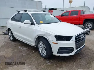 2018 Audi Q3 Premium with VIN WA1BCCFS1JR010439, listed as a IAAI auction lot 41641231 with 108,605 mi miles. Bid and sale history available at carsss.com. Image 1.
