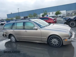 2001 Mercedes-Benz E-Class with VIN WDBJH65J41B349359, listed as a IAAI auction lot 41532318 with 96,375 mi miles. Bid and sale history available at carsss.com. Image 13.