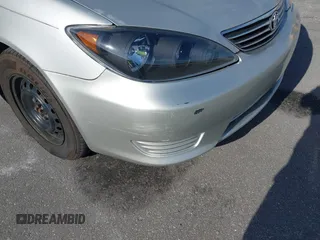 2006 Toyota Camry STD with VIN 4T1BE32K46U647704, listed as a IAAI auction lot 42158768 with 171,116 mi miles and . Bid and sale history available at DreamBid. Image 12.