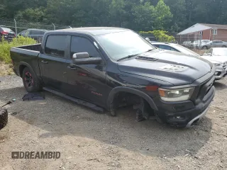 2019 Ram 1500 Rebel with VIN 1C6SRFLT6KN722481, listed as a Copart auction lot 60653285 with 79,447 mi miles and Salvage title. Bid and sale history available at DreamBid. Image 4.