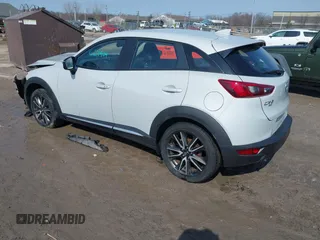 2016 Mazda CX-3 Grand Touring with VIN JM1DKFD76G0134205, listed as a IAAI auction lot 41661904 with 190,368 mi miles. Bid and sale history available at carsss.com. Image 3.