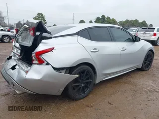 2018 Nissan Maxima SL z VIN 1N4AA6AP7JC390715, wystawiony jako IAAI lot #41397498 z przebiegiem 81 483 mil mil oraz . Historia ofert i sprzedaży dostępna na DreamBid. Obrazek 4.