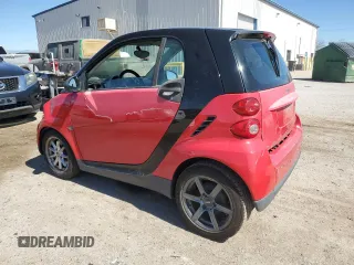 2009 Smart fortwo Pure z VIN WMEEJ31X39K233387, wystawiony jako Copart lot #46931285 z przebiegiem 79 695 mil mil oraz Tytuł czysty. Historia ofert i sprzedaży dostępna na DreamBid. Obrazek 2.