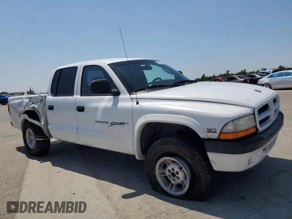 2000 Dodge Dakota Sport with VIN 1B7GG2AN8YS598547, listed as a Copart auction lot 54520985 with 244,605 mi miles and Salvage Title. Bid and sale history available at carsss.com. Image 4.