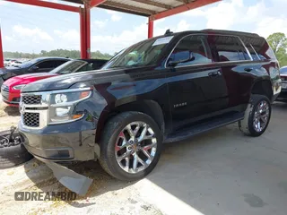2019 Chevrolet Tahoe LT z VIN 1GNSKBKCXKR361392, wystawiony jako IAAI lot #42661332 z przebiegiem 112 973 mil mil oraz . Historia ofert i sprzedaży dostępna na DreamBid. Obrazek 18.