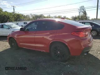2015 BMW X4 xDrive35i with VIN 5UXXW5C58F0E87038, listed as a Copart auction lot 71291533 with 0 mi miles. Bid and sale history available at carsss.com. Image 2.