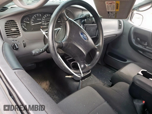 2003 Ford Ranger XL with VIN 1FTYR14V13PB23774, listed as a Copart auction lot 57166565 with 170,638 mi miles and Salvage title. Bid and sale history available at DreamBid. Image 8.