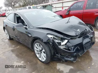 2018 Tesla Model 3 Long Range Battery with VIN 5YJ3E1EB3JF090567, listed as a IAAI auction lot 41568312 with 35,327 mi miles and . Bid and sale history available at DreamBid. Image 1.