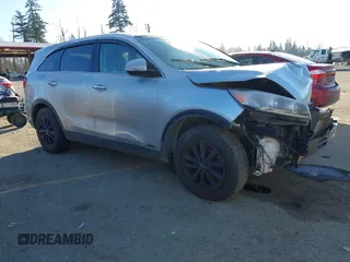 2019 Kia Sorento LX V6 with VIN 5XYPGDA56KG506179, listed as a IAAI auction lot 41409303 with 116,488 mi miles. Bid and sale history available at carsss.com. Image 1.