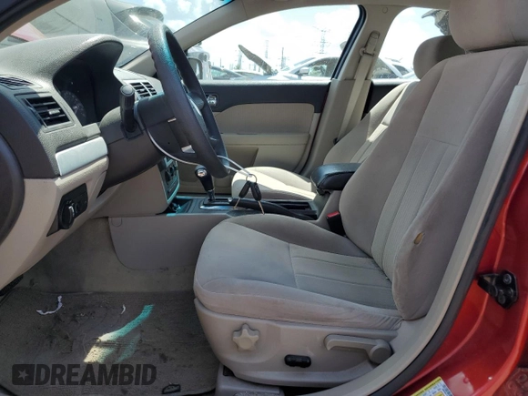2006 Mercury Milan with VIN 3MEFM07156R603787, listed as a Copart auction lot 63317745 with 83,704 mi miles and Salvage title. Bid and sale history available at DreamBid. Image 7.