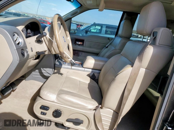 2005 Ford F-150 XLT with VIN 1FTPX12575NB60735, listed as a Copart auction lot 49598075 with 153,360 mi miles and Salvage title. Bid and sale history available at DreamBid. Image 7.
